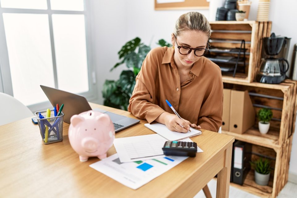 young woman working in home office