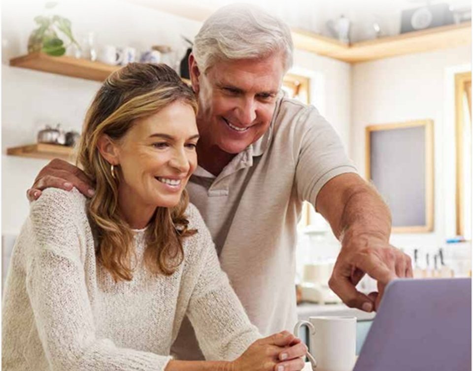 Couple checking their retirement plans
