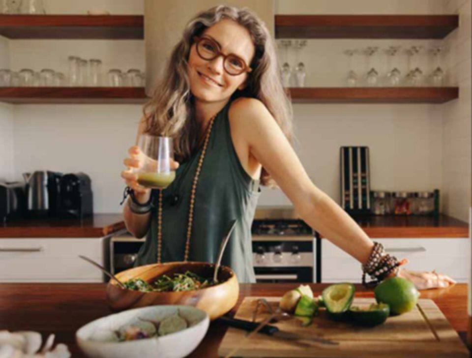 Happy woman in kitchen